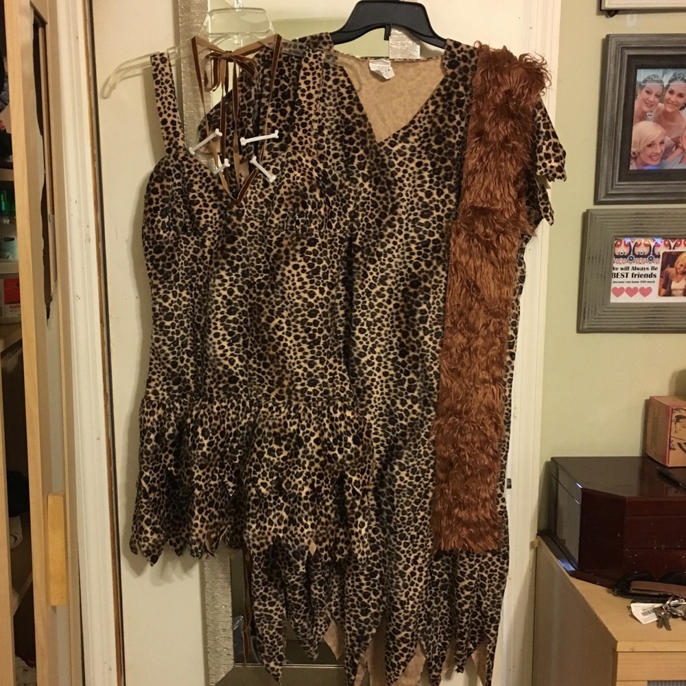 Cavegirl and caveman costumes
